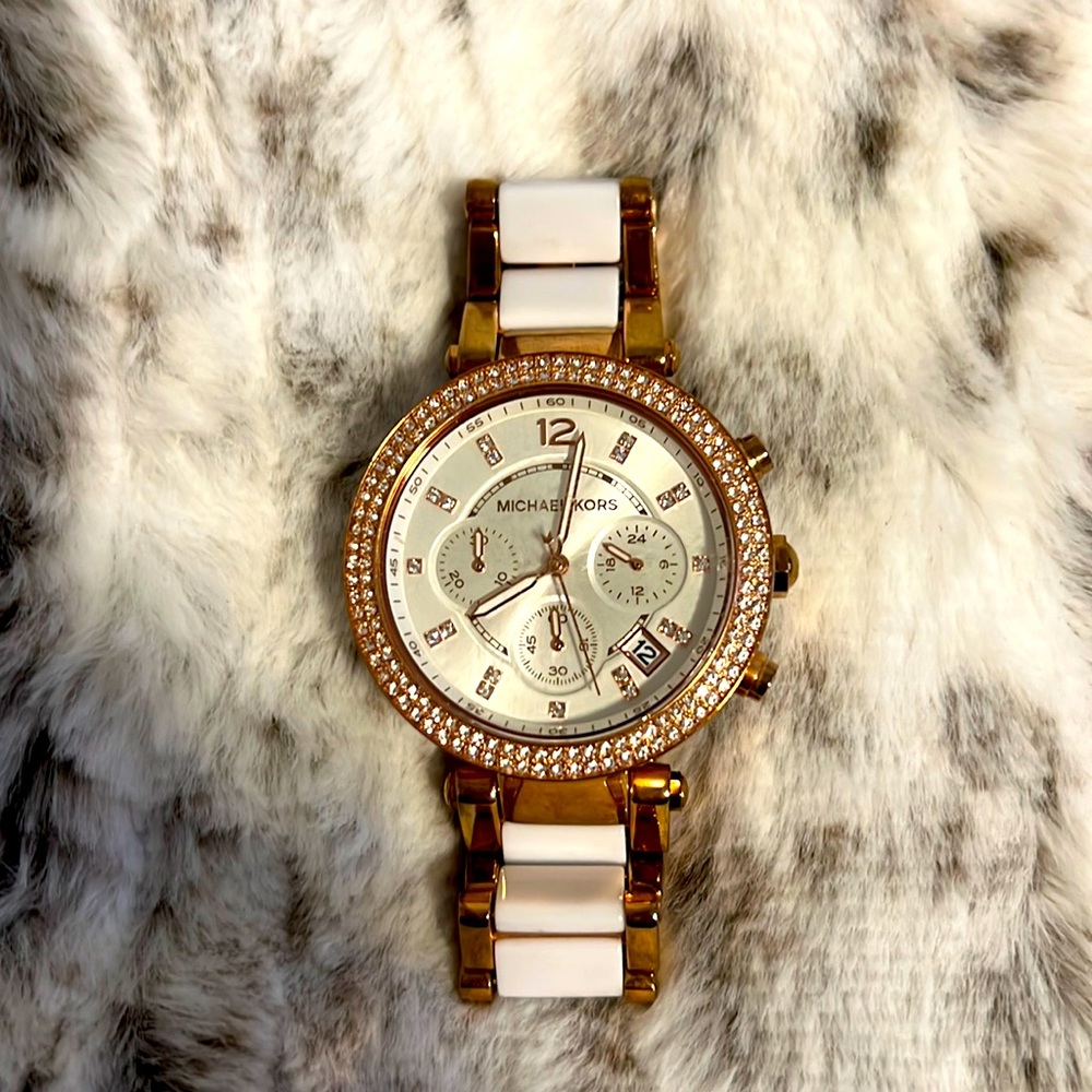 Michael kors two tone watch.